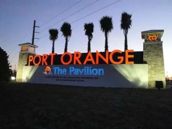 The Pavilion at Port Orange sign at dusk